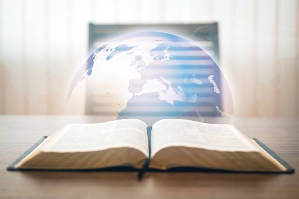 Holy bible book on wooden table